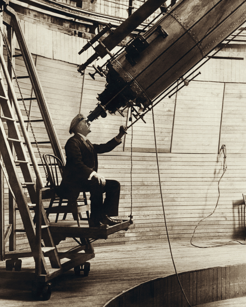Percival Lowell at his observatory in 1914. Lowell often viewed Mars from here. Via Wikimedia Commons.