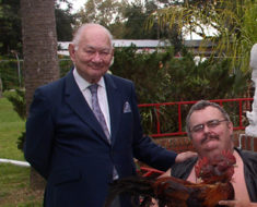 At Ward Hall's house in Gibtown. From left to right: Ward, Bruce Snowdon holding a two-headed chicken, little Pete Terhurne, and me. December, 2003.