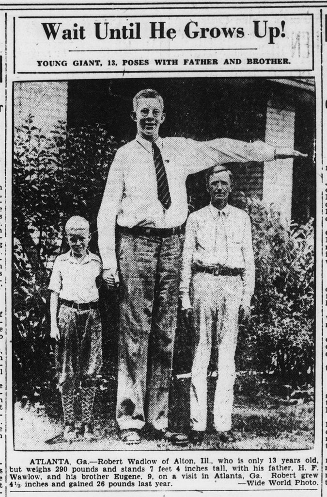 Robert Wadlow at age 13, featured in The Evening Star, July 24, 1931. He stood 7'-4" in this photo and weighed 290 pounds.