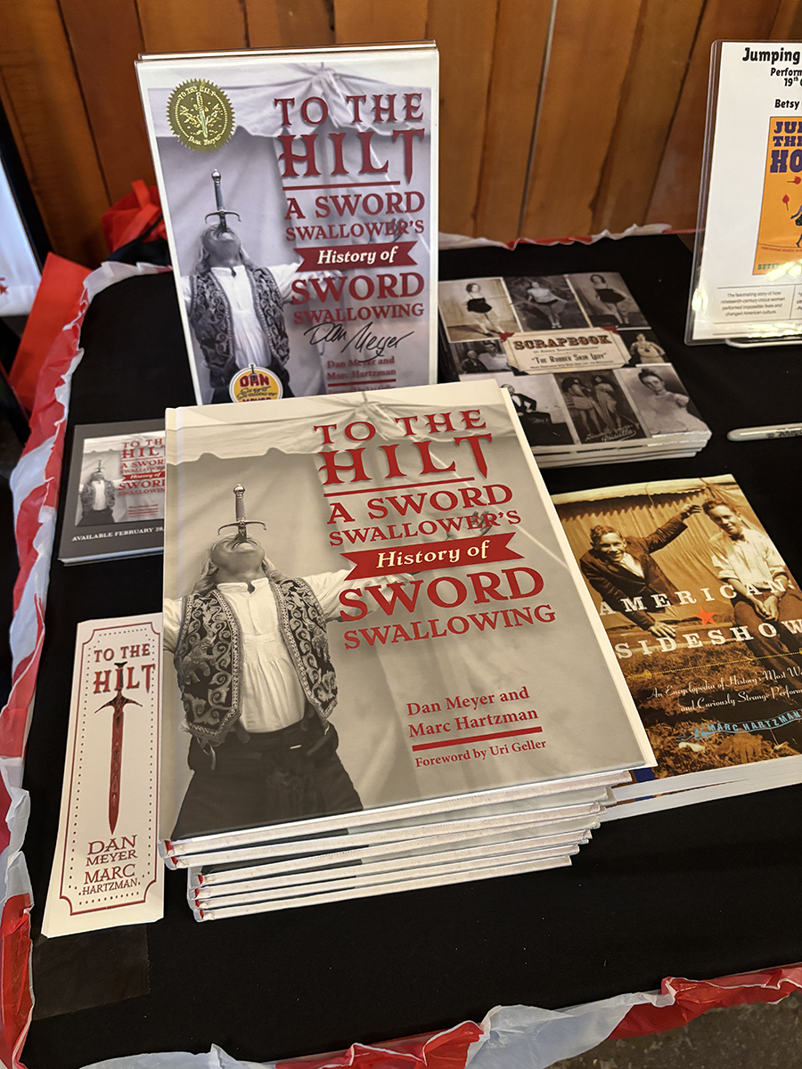 Sideshow books on table